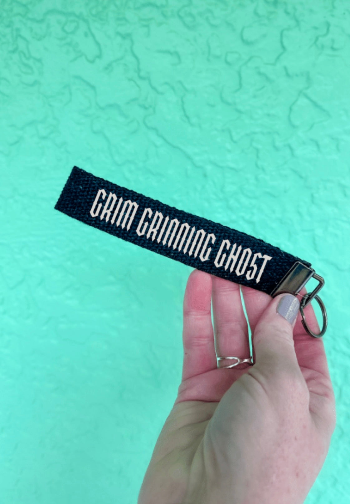 Grim Grinning Ghost keychain wristlet