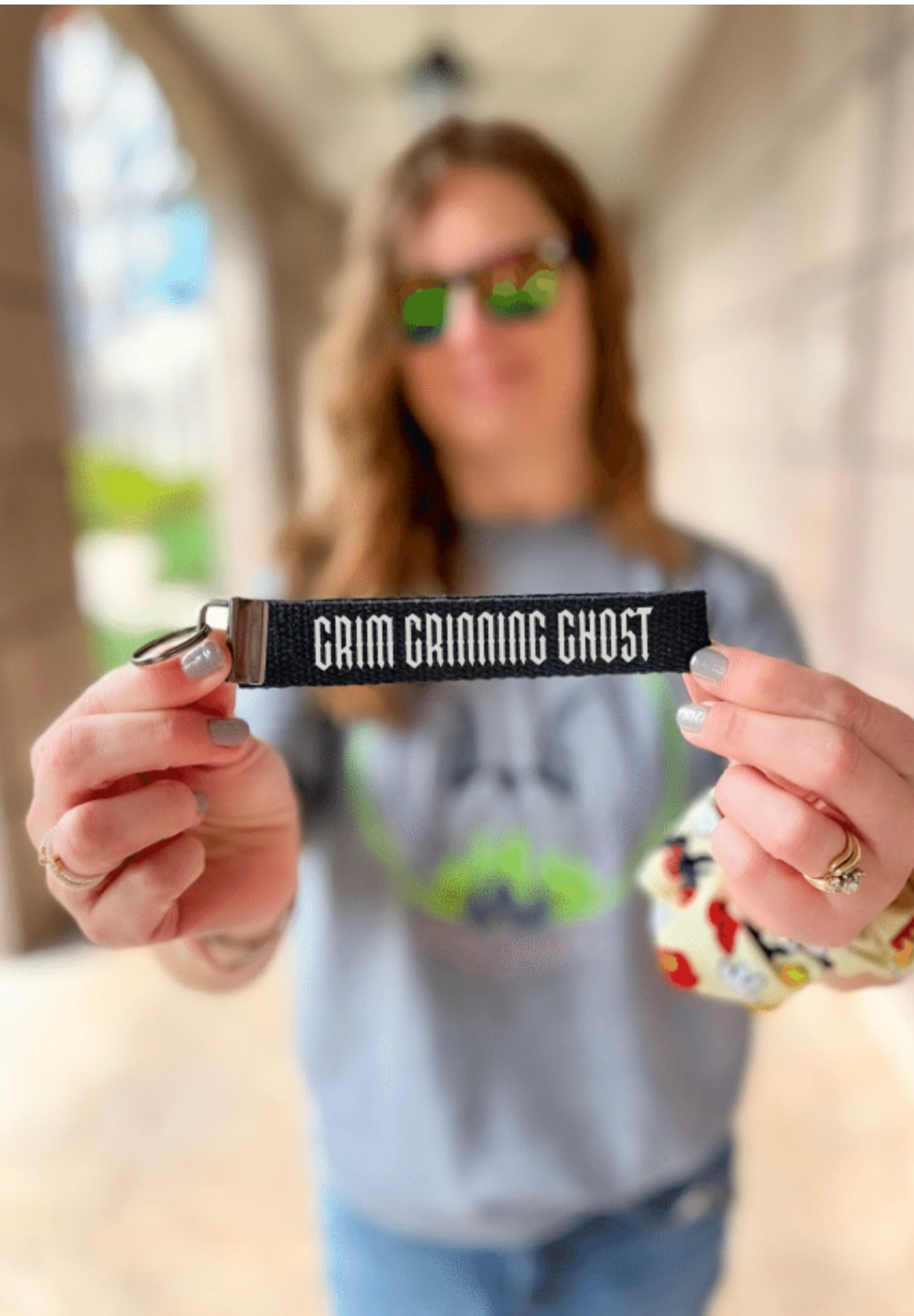 Grim Grinning Ghost keychain wristlet