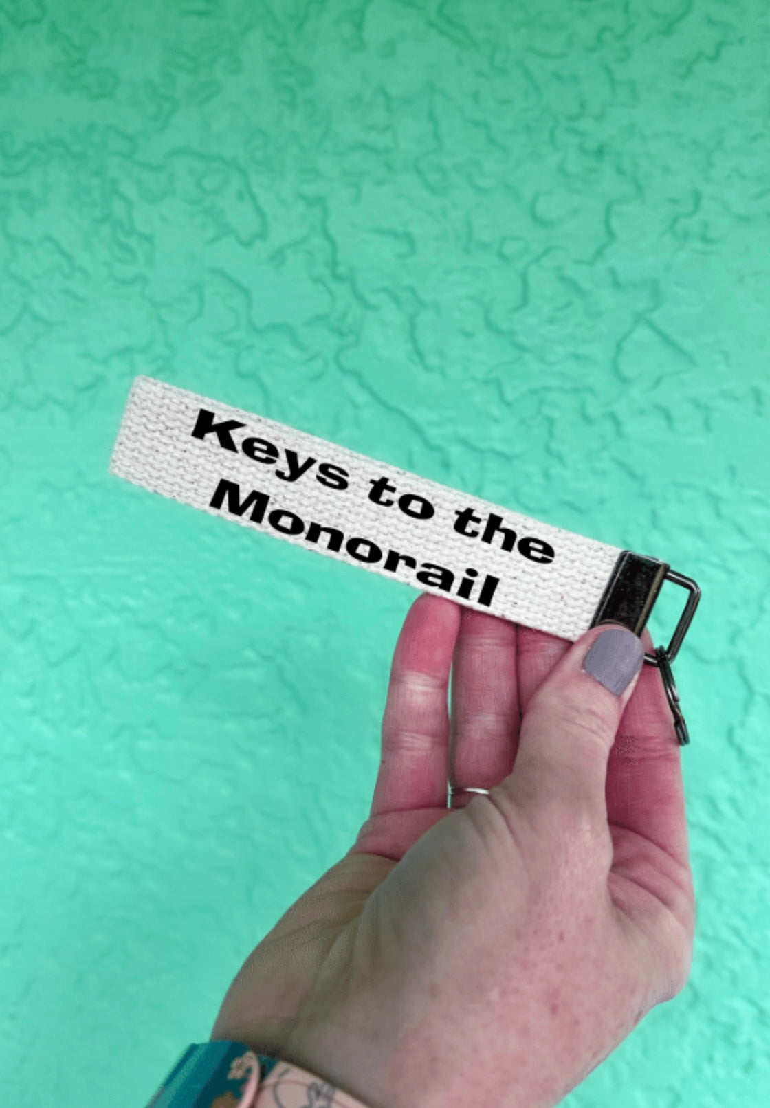 Keys to the Monorail keychain wristlet