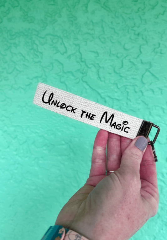 Unlock the Magic keychain wristlet