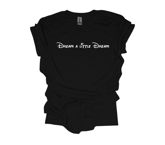 Black short sleeved t-shirt with the words Dream a little dream in Walt font