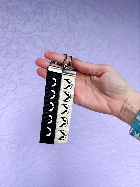 Grim Grinning Eyes keychain wristlet